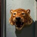 Vintage handcrafted leather tiger face wall hanging